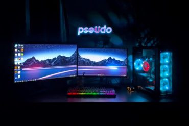 A gaming setup with dual monitor and focusing RGB theme