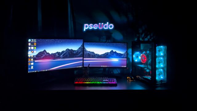 A gaming setup with dual monitor and focusing RGB theme