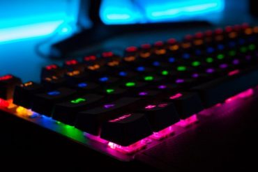 A mechanical keyboard glowing in Red Blue and Green color