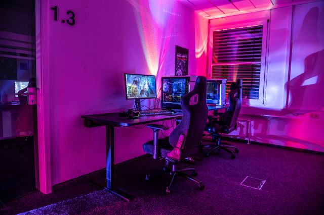 Gaming room with gaming setup; why is rgb so popular